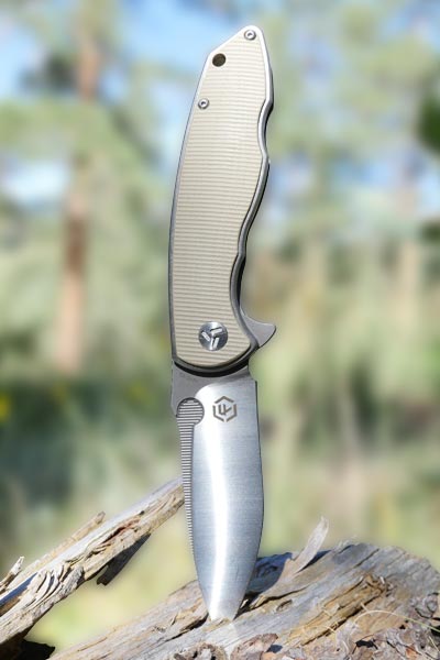 knife absolute titanium blade wood